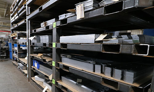 Inventory racks with metal sheets