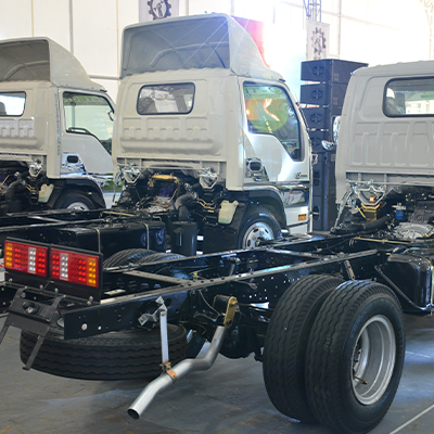 Metal fabricated chassis for a cab over truck